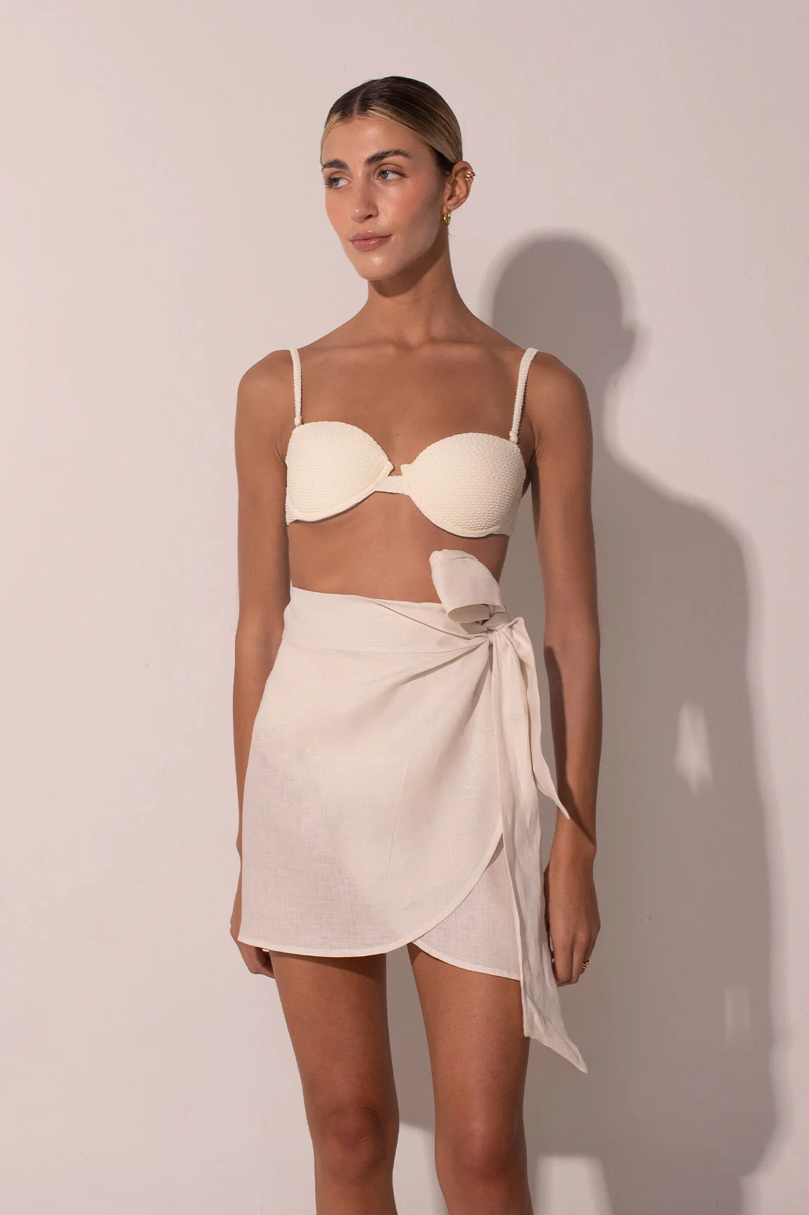 The Maxi Bow Wrapped Mini Skirt